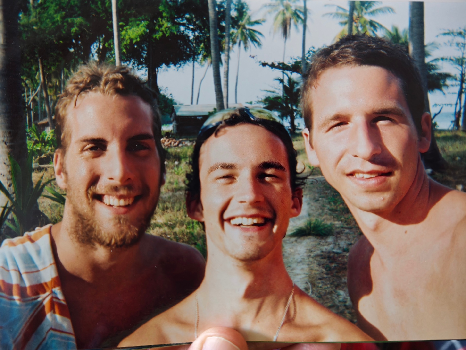 Backpacking on a beach with palm trees
